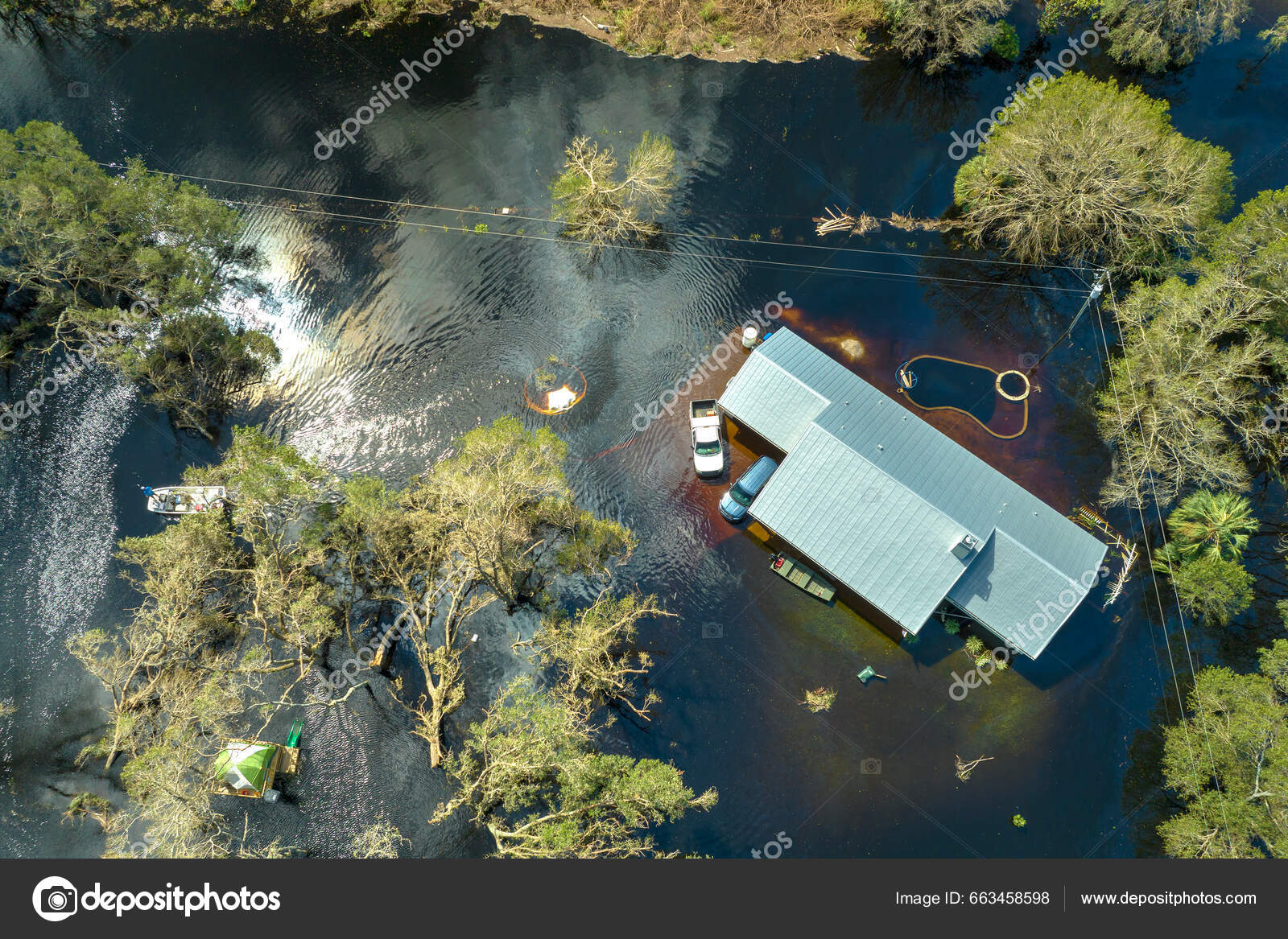 Aftermath of natural disaster. Flooded houses by hurricane Ian rainfall in Florida residential area.